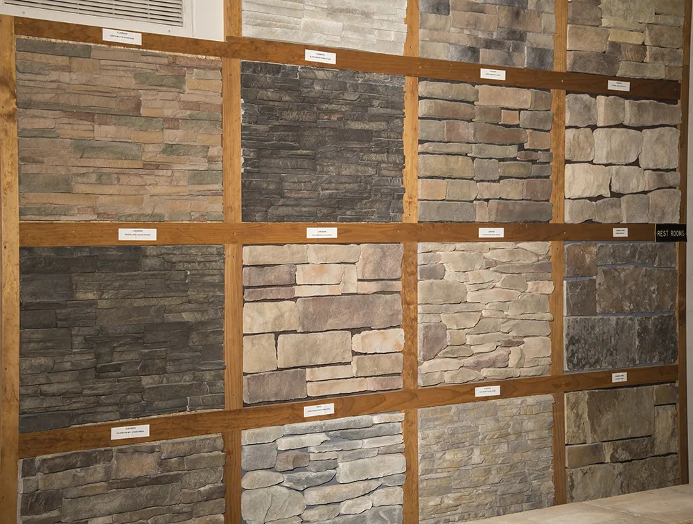 Concrete Products showroom wall with different slates and pavers.